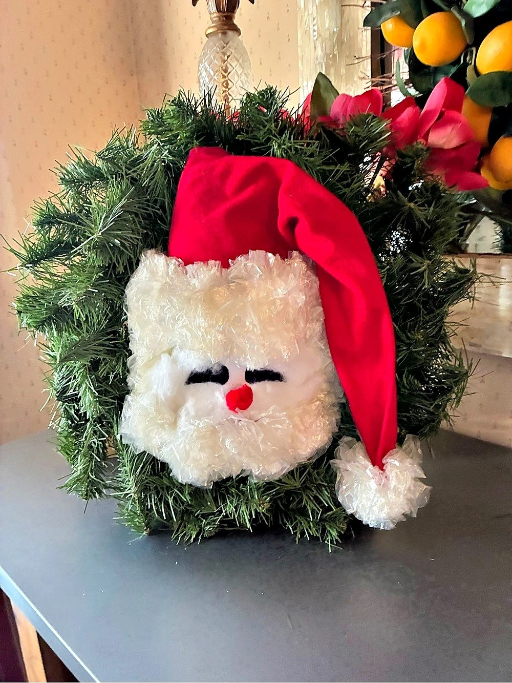HANDMADE, Christmas Wreath with SANTA CLAUSE face decoration mounted inside .